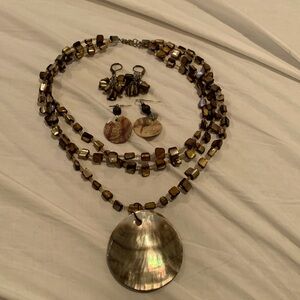 EUC necklace and 2 pairs of earrings in brown and cream. Pendant is two shells